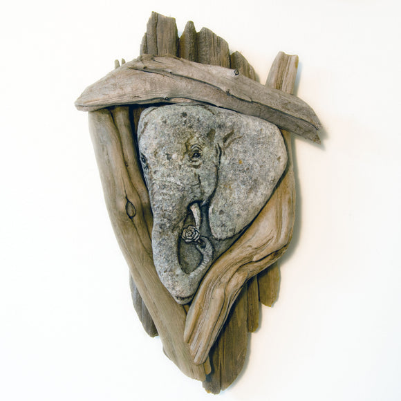 Found natural shaped elephant stone minimally painted and framed in driftwood